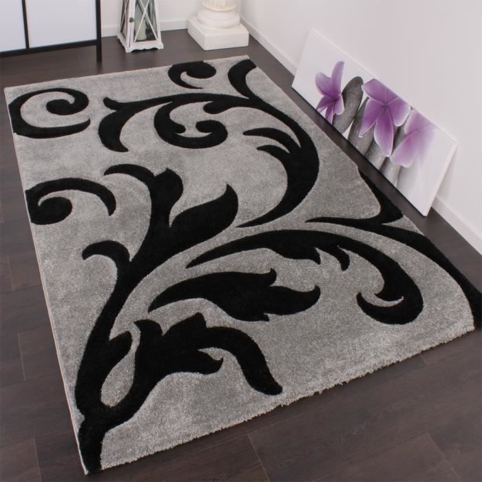 Designer tapis festival avec des contours coupe rétro motif gris noir blanc 