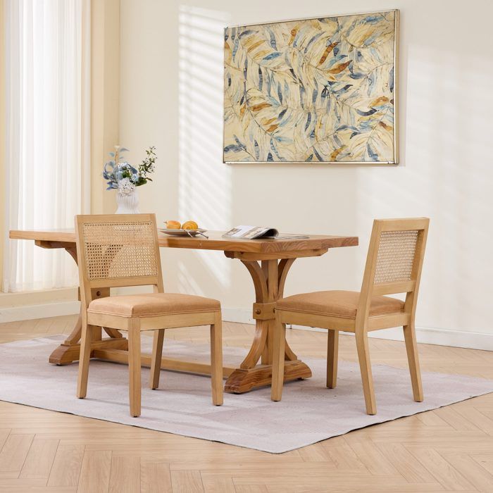 2 chaises en rotin beige dossier cannage piètement bois coussin mousse style scandinave pour cuisine et salle à manger