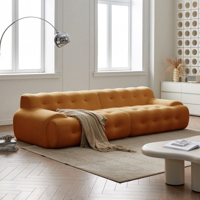Canapé en tissu livré Roulé couleur Orange