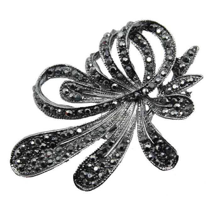 Broche Art Déco vintage en argent sterling avec fausses pierres vertes - France