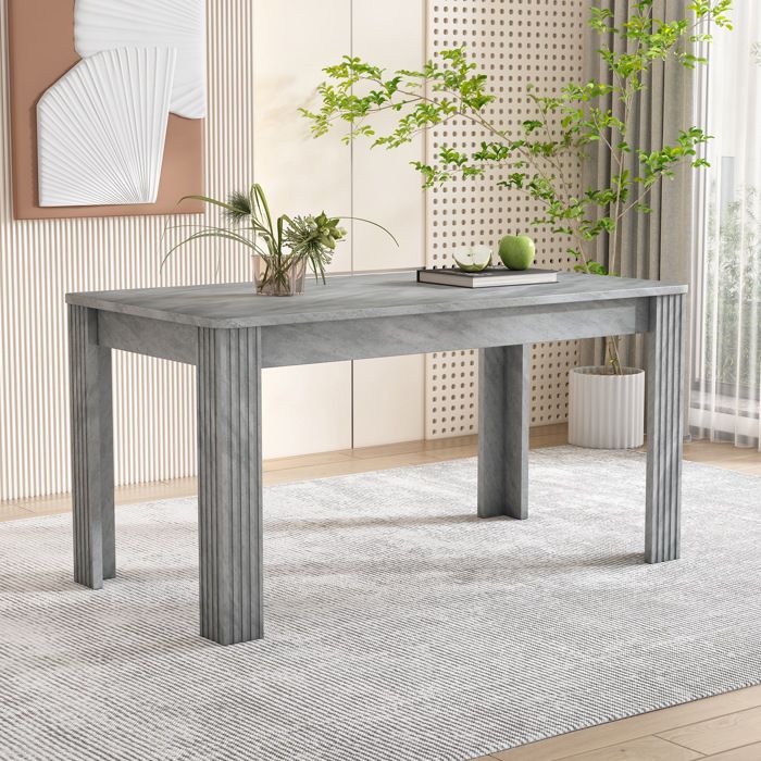 Table de salle à manger grise au décor bois avec quatre pieds stables