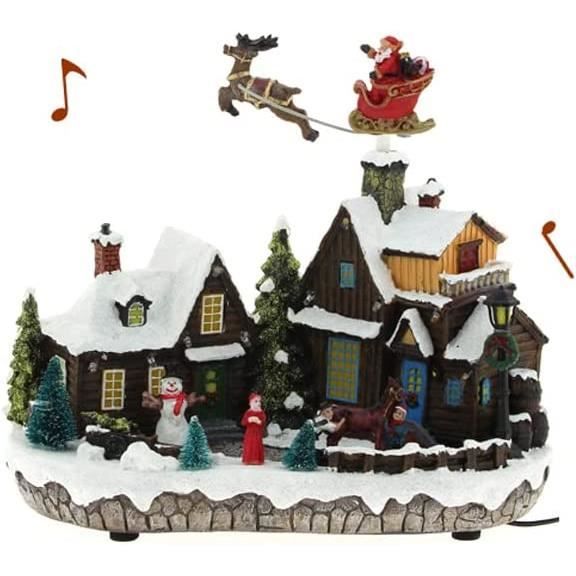 Village de Noël Animé et Musical avec Père Noël et traineau dans Le
