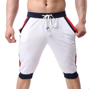 PANTACOURT Pantalon court homme de sport jogging avec cordon 8 points pantalons hommes slims été section mince de Marque-Blanc