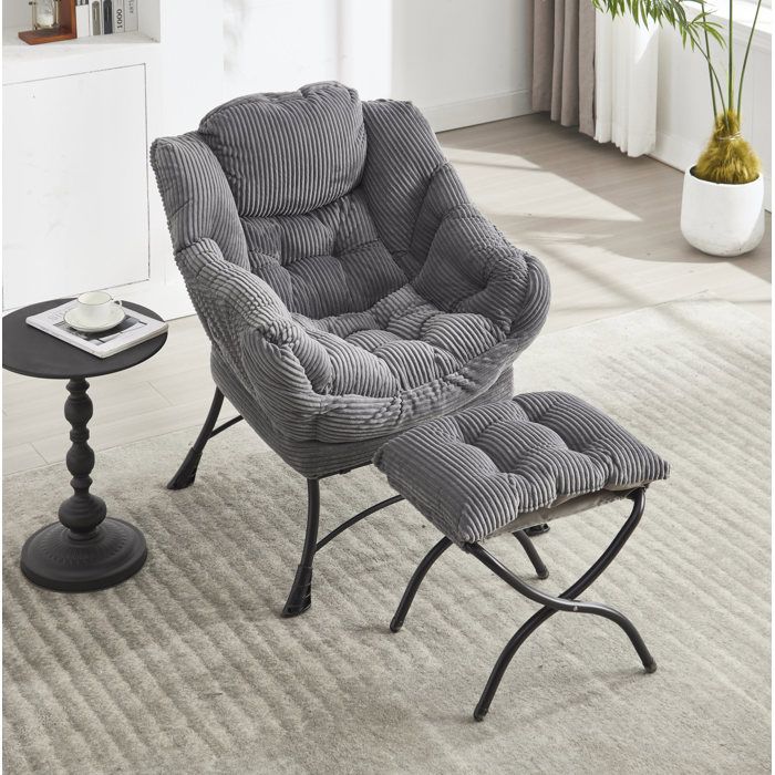 Fauteuil lounge avec ottoman gris tissu doux acier accoudoirs poche latérale relaxation 1 place FOLYNA