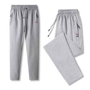 COLLANT DE RUNNING Pantalon de sport décontracté pour homme en coton gris avec poche zippée - Running Fitness