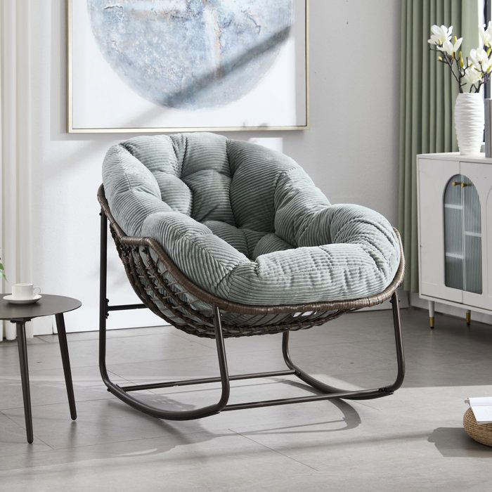 Fauteuil à bascule en rotin synthétique EVRYAE 78 x 106 x 90 cm avec coussin structure acier vert