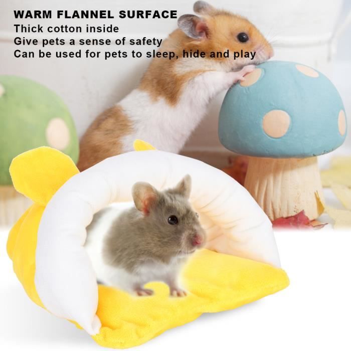 Le nid mignon de coton de hamster a épaissi le lit chaud de chien