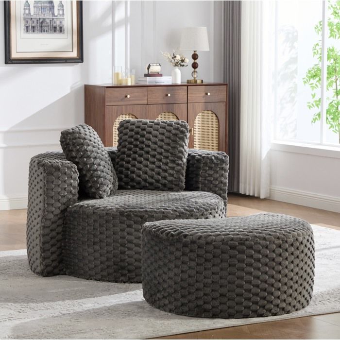 Fauteuil compressé rond 360° en tissu gris foncé avec repose-pieds