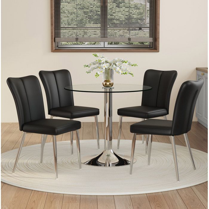 MEUBLIV Ensemble table à manger ronde en verre 85 cm avec 4 chaises PU noir et pieds métalliques argentés