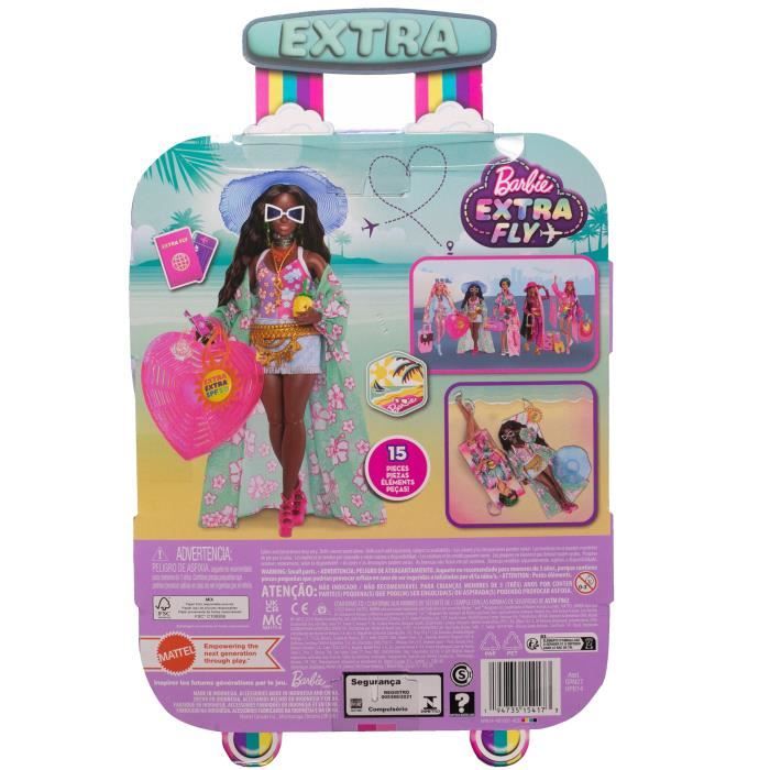 Achète la poupée Barbie de plage avec le maillot de bain rose & bleu à Achète la poupée Barbie de plage avec le maillot de bain rose & bleu à